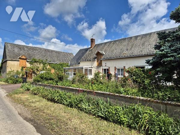 Une maison à usage d’habitation sise dite commune.