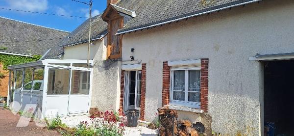Une maison à usage d’habitation sise dite commune.