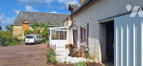 Une maison à usage d’habitation sise dite commune.