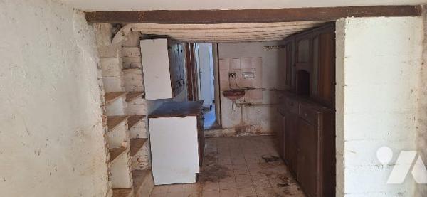 Une maison à usage d’habitation sise dite commune.