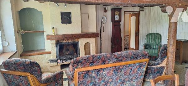 Une maison à usage d’habitation sise dite commune.