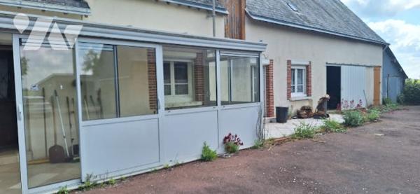 Une maison à usage d’habitation sise dite commune.