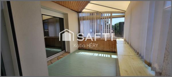 Appartement avec ascenseur, garage, cave, véranda et balcon