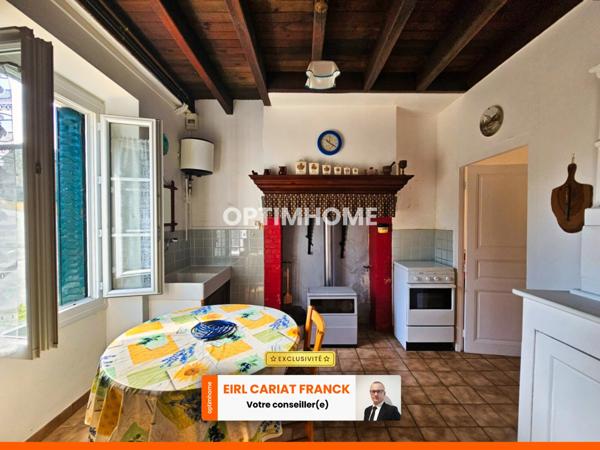 MAISON EN PIERRE DE 60 M², SUR 1629 M² DE TERRAIN AVEC DÉPENDANCES