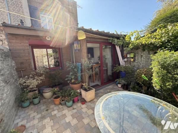 Maison semi mitoyenne avec cour