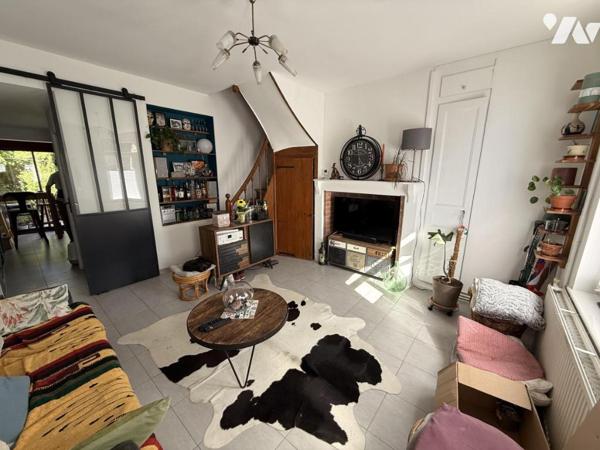 Maison semi mitoyenne avec cour