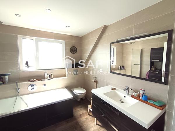 Maison familiale de 107 m² habitables avec jardin et garage