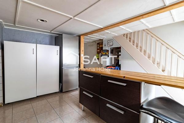 Maison mitoyenne à rénover 216 m2 à Fort potentiel