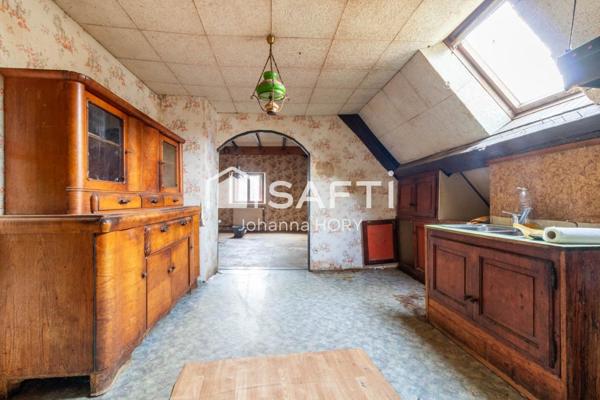 Maison mitoyenne à rénover 216 m2 à Fort potentiel