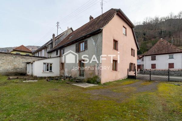 Maison mitoyenne à rénover 216 m2 à Fort potentiel