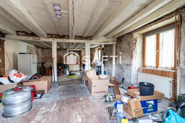 Maison mitoyenne à rénover 216 m2 à Fort potentiel