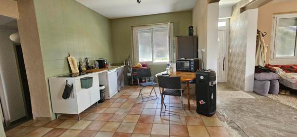 Maison en pierre avec beau potentiel