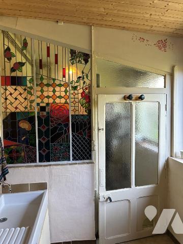 Maison ancienne en pierre au coeur du bourg