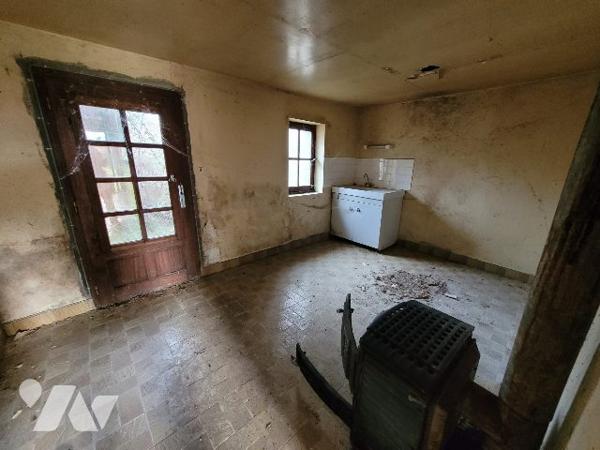 Maison à réhabilier avec terrain