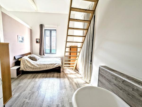 Immeuble 1 commerce + 4 appartements