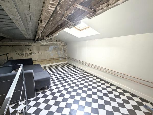 Immeuble 1 commerce + 4 appartements