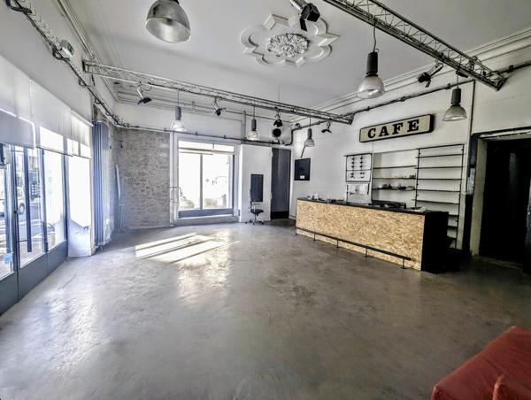 Immeuble 1 commerce + 4 appartements