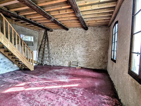 Immeuble 1 commerce + 4 appartements