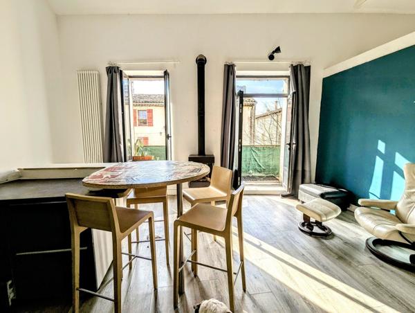 Immeuble 1 commerce + 4 appartements