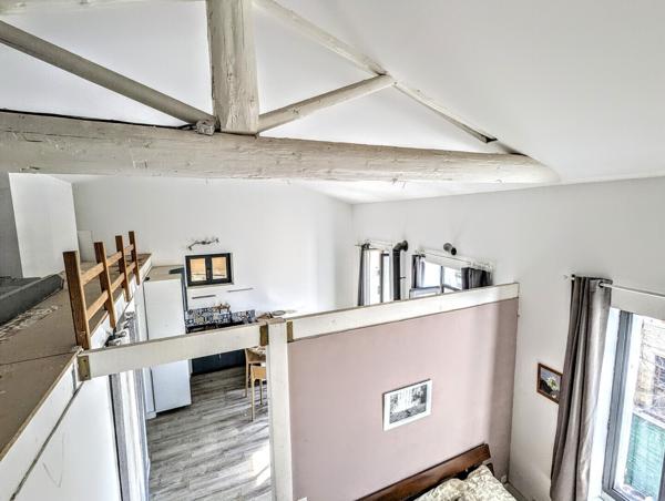 Immeuble 1 commerce + 4 appartements