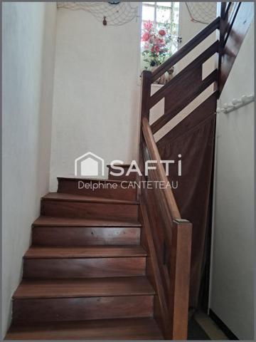 Belle et grande maison bord de l'océan