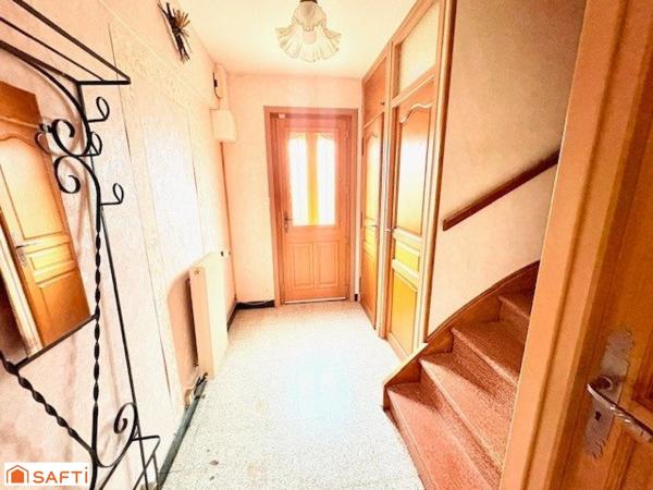 Beuvrages – Maison semi individuelle avec garage et jardin