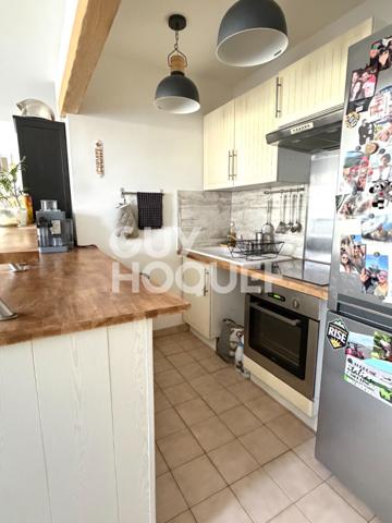 Appartement au Coudray-Montceaux avec box et place de parking