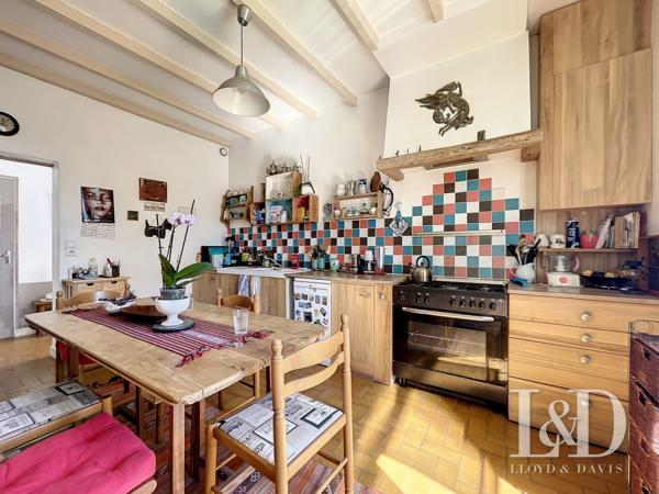 SAUJON CENTRE : maison 108 m² + dépendance, 3 chambres et jardin