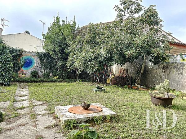 SAUJON CENTRE : maison 108 m² + dépendance, 3 chambres et jardin