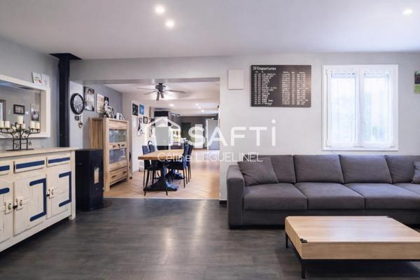 À Ouerre, maison familiale lumineuse avec vie de plain-pied, jardin, terrasse et atelier, au calme et proche Dreux/RN12 avec école sur place.