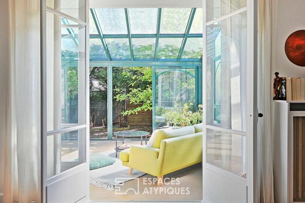 La meulière rénovée avec sa véranda et un jardin sans vis-à-vis