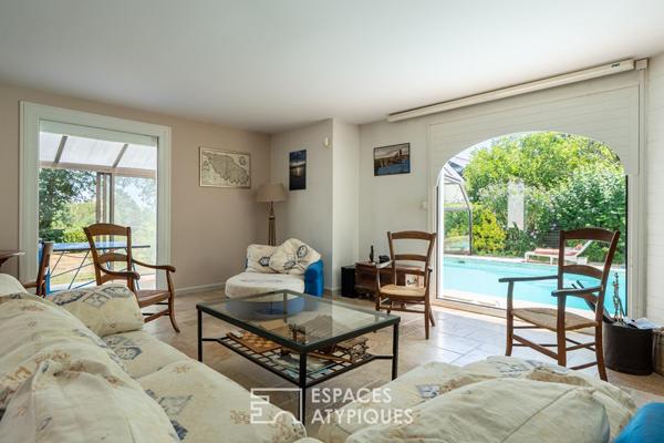 Maison familiale et sa piscine couverte face à l’Erdre à La Chapelle-sur-Erdre