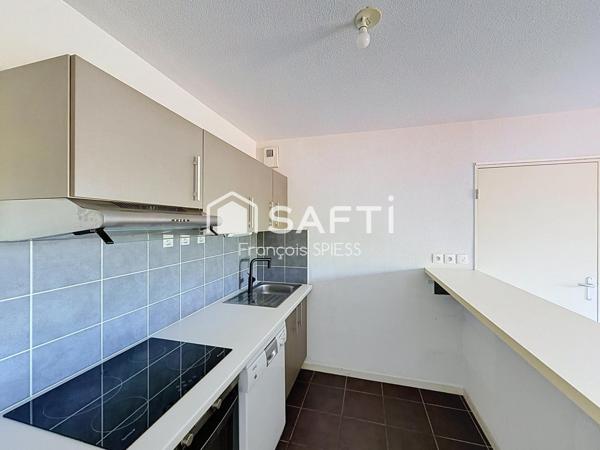 Bel appartement T3 avec balcon et place de parking
