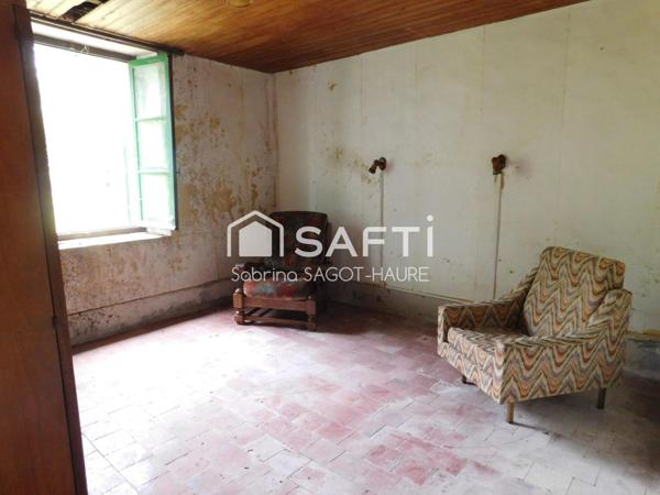 Longère sur parc de 2460m2 avec grange et garage