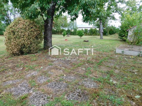 Longère sur parc de 2460m2 avec grange et garage