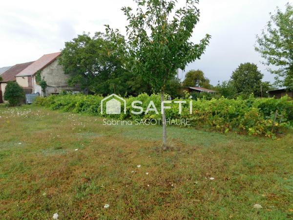 Longère sur parc de 2460m2 avec grange et garage