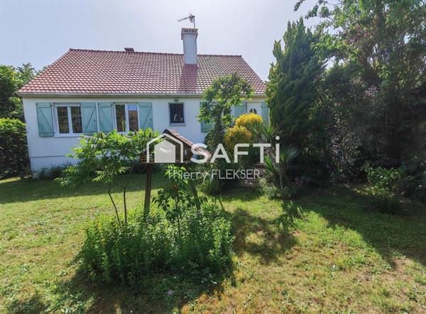 Belle maison familiale avec sous-sol total, garage et beaux volumes.