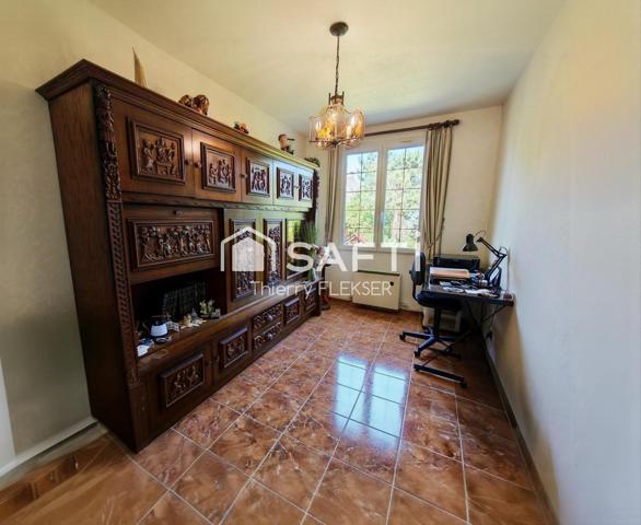 Belle maison familiale avec sous-sol total, garage et beaux volumes.