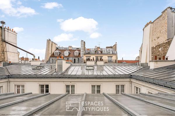 Dernier étage sous les toits repensé par architecte dans le Haut Marais