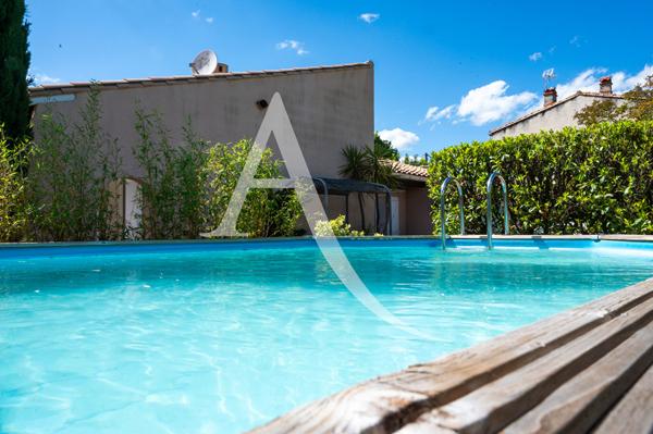 Maison de charme avec jardin, garage et terrasse aménagée proche Carcassonne