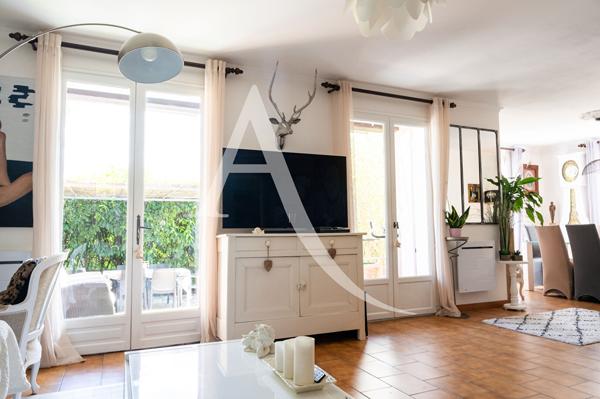 Maison de charme avec jardin, garage et terrasse aménagée proche Carcassonne