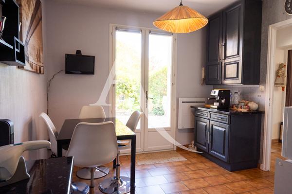 Maison de charme avec jardin, garage et terrasse aménagée proche Carcassonne