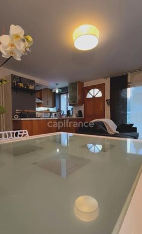 T3 Rez-de-Jardin 57 m² – Terrasse 60 m², Parking couvert, Cave 26 m² – À 5 min de Voiron