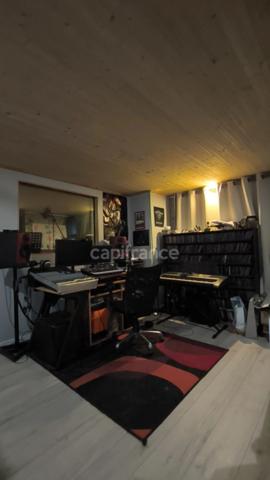 T3 Rez-de-Jardin 57 m² – Terrasse 60 m², Parking couvert, Cave 26 m² – À 5 min de Voiron