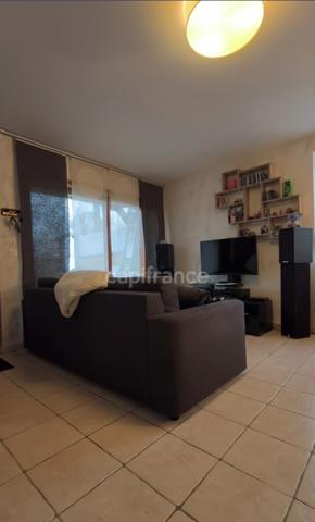 T3 Rez-de-Jardin 57 m² – Terrasse 60 m², Parking couvert, Cave 26 m² – À 5 min de Voiron