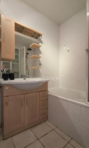 T3 Rez-de-Jardin 57 m² – Terrasse 60 m², Parking couvert, Cave 26 m² – À 5 min de Voiron