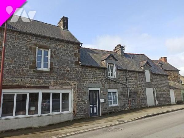 Maison de bourg sans jardin construite en pierres sous ardoises naturelles  à finir d'aménager ...