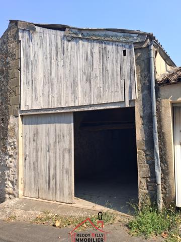 EXCLUSIVITE ! Garage avec mezzanine en plein centre !