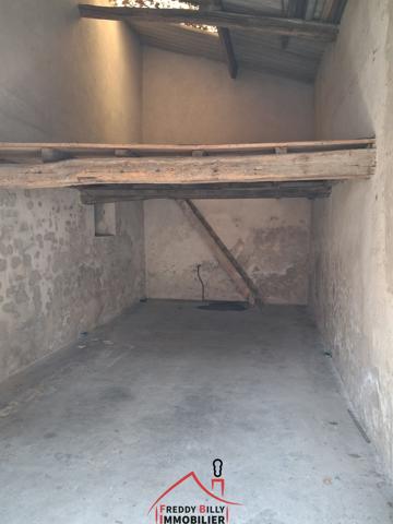 EXCLUSIVITE ! Garage avec mezzanine en plein centre !