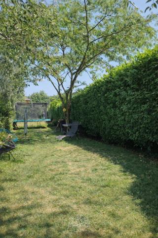 Semi individuelle en plein canon d'or - garage et jardin